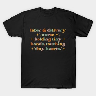 Holding tiny hands, touching tiny hearts Funny Labor And Delivery Nurse L&D Nurse RN OB Nurse midwives T-Shirt